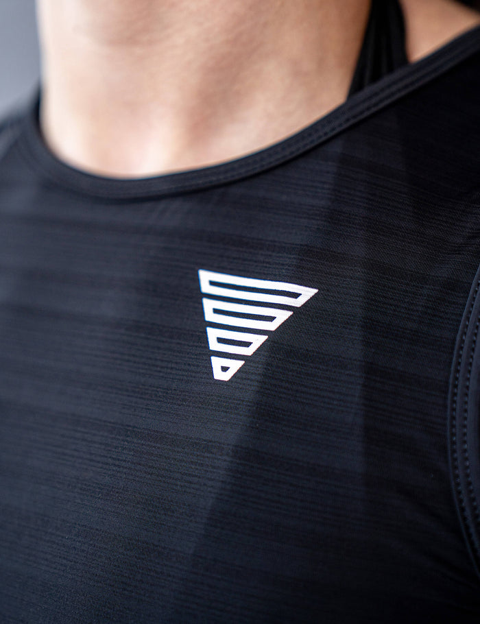 Close up of a GORNATION athlete wearing the GORNATION active tank top