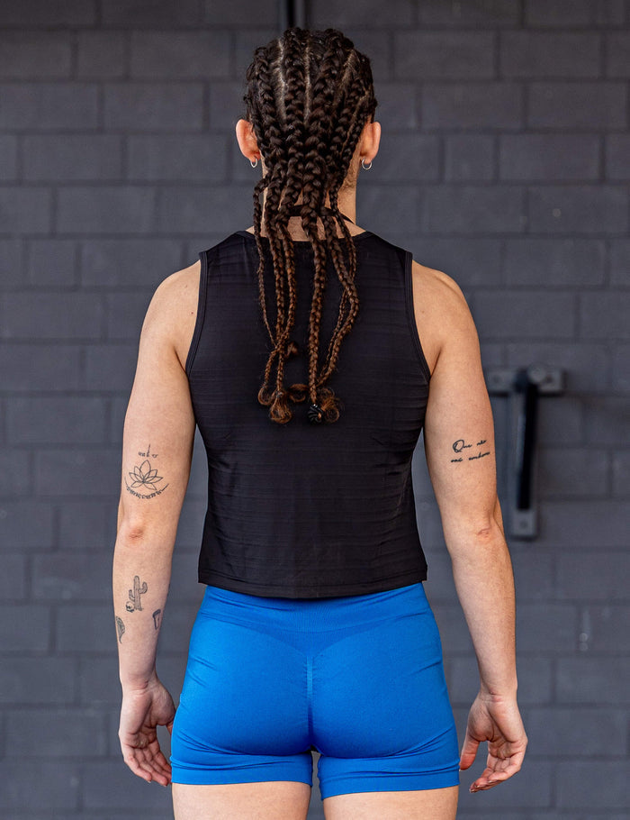 GORNATION athlete wearing the GORNATION active tank top