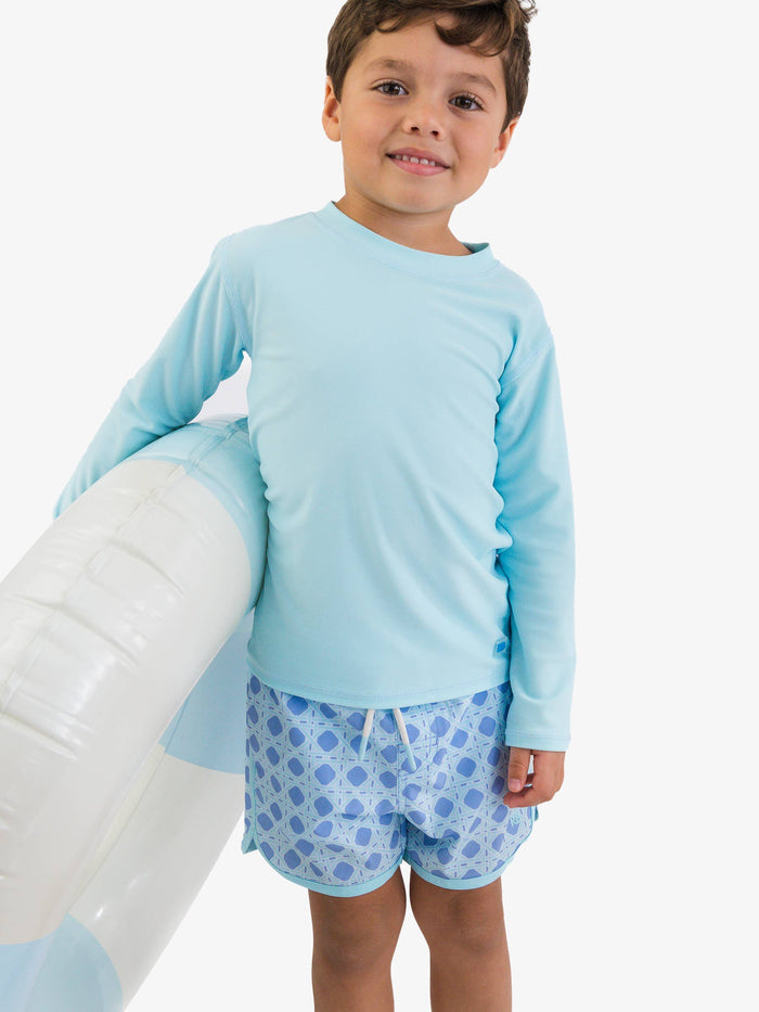 Boys Periwinkle Blue Coastal Cane Performance Hybrid Dolphin Hem Swim Trunks
