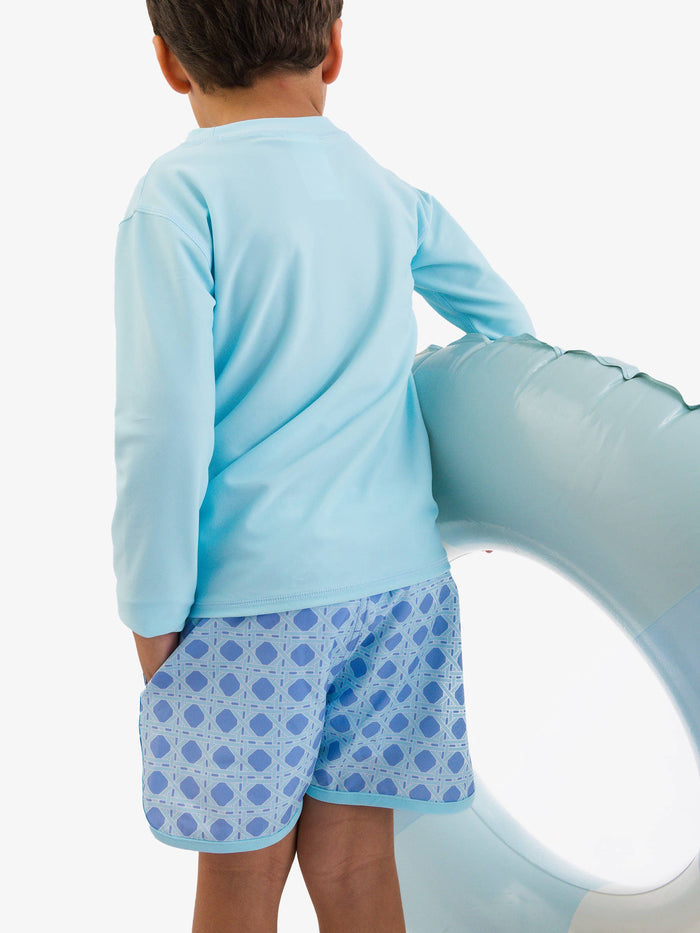 Boys Periwinkle Blue Coastal Cane Performance Hybrid Dolphin Hem Swim Trunks