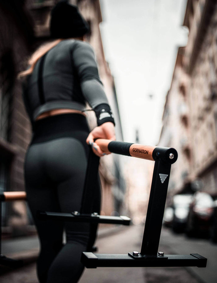 Calisthenics woman with Parallettes MAX