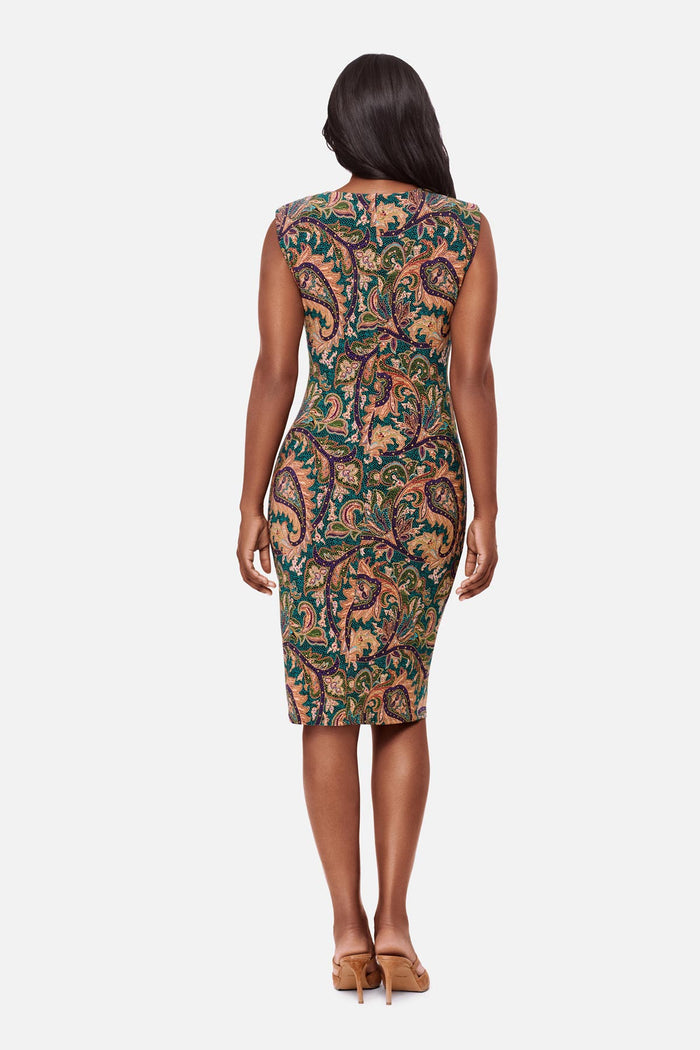 Woman turned away wearing a multicolor paisley printed short sleeve dress