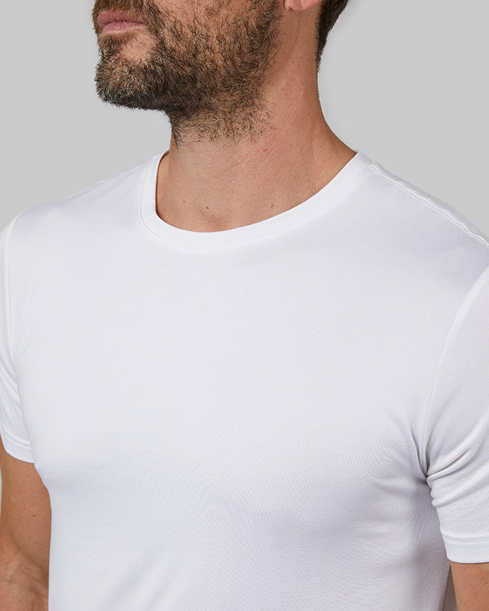 32 Degrees White _ Men's 4PK Cool Crew Neck Tee {model: Cedric is 6'1.5", wearing size M}{bottom}{right}{bottom}{right}