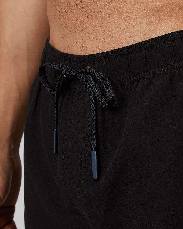 32 Degrees Black _ Men's 6-Inch swim short {model: Beau is 6'2", wearing size M}{bottom}{right} {bottom}{right}