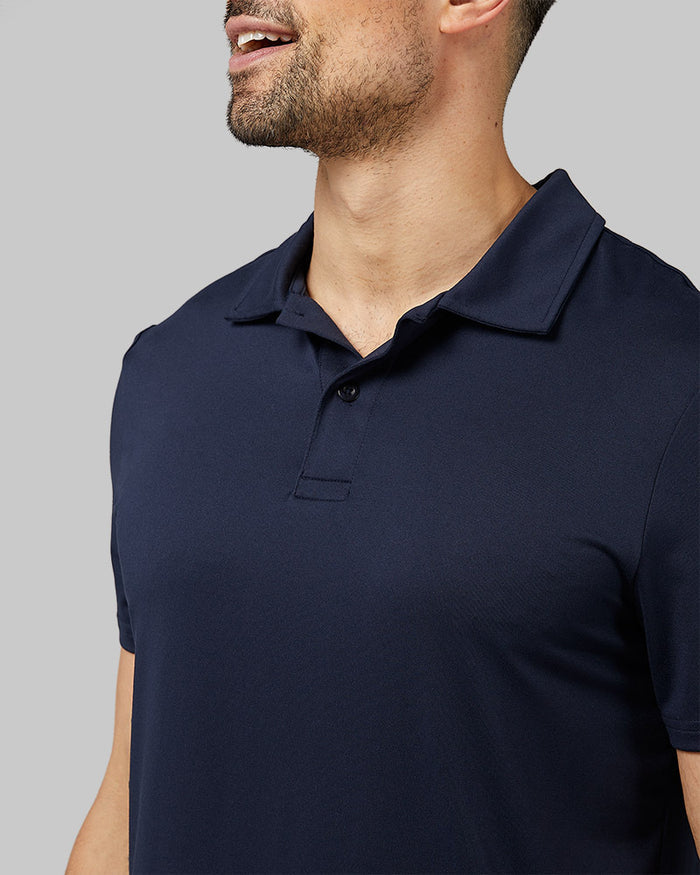 32 Degrees Navy _ Men's Cool Classic Polo  {model: Daniel is 6'2", wearing size M}{bottom}{right}