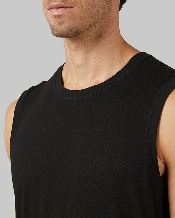 32 Degrees Black _ Men's Cool Relaxed Tank {model: Fran is 6'2", wearing size M}{bottom}{right} {bottom}{right}