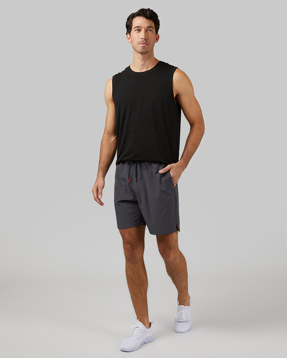 32 Degrees Black _ Men's Cool Relaxed Tank {model: Fran is 6'2", wearing size M}{bottom}{right} {bottom}{right}