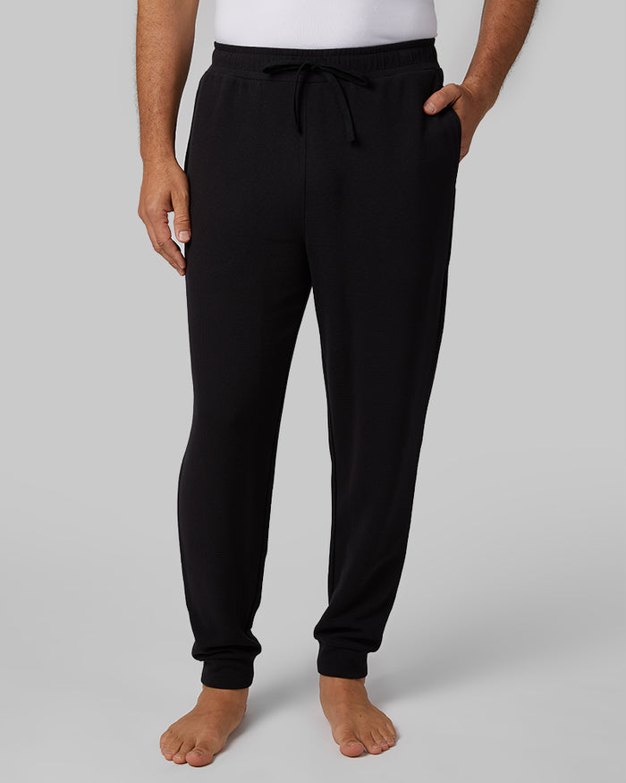32 Degrees Black _ Men's Everyday Comfort Jogger {model: Eduardo is 6'1", wearing size M}{bottom}{right} {bottom}{right}