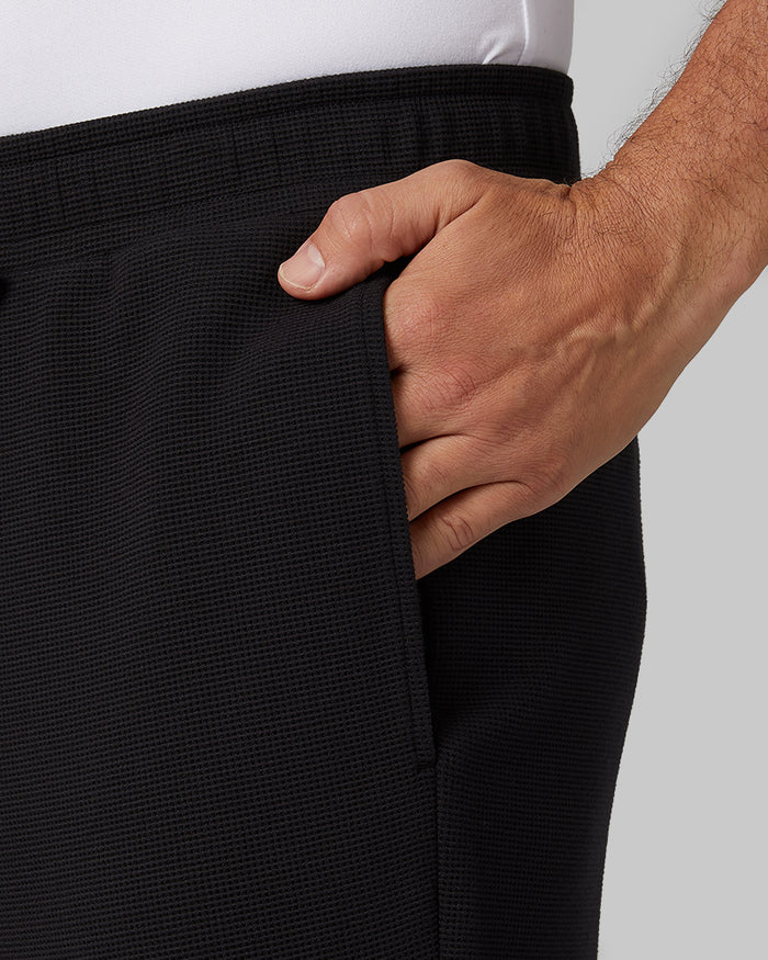 32 Degrees Black _ Men's Everyday Comfort Jogger {model: Eduardo is 6'1", wearing size M}{bottom}{right} {bottom}{right}