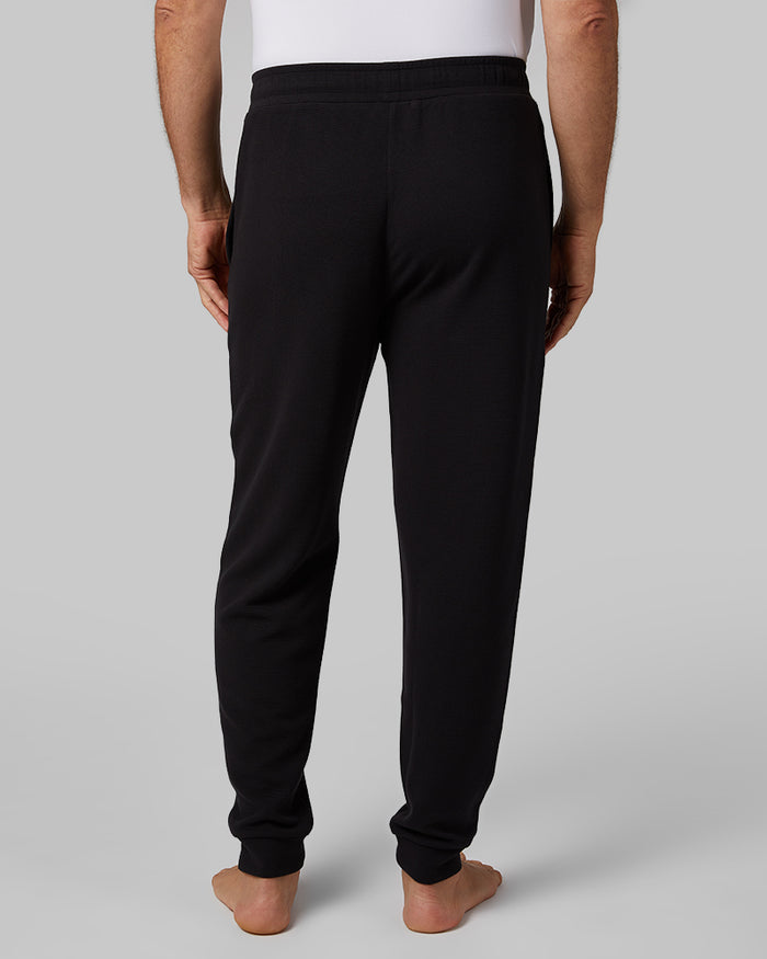 32 Degrees Black _ Men's Everyday Comfort Jogger {model: Eduardo is 6'1", wearing size M}{bottom}{right} {bottom}{right}