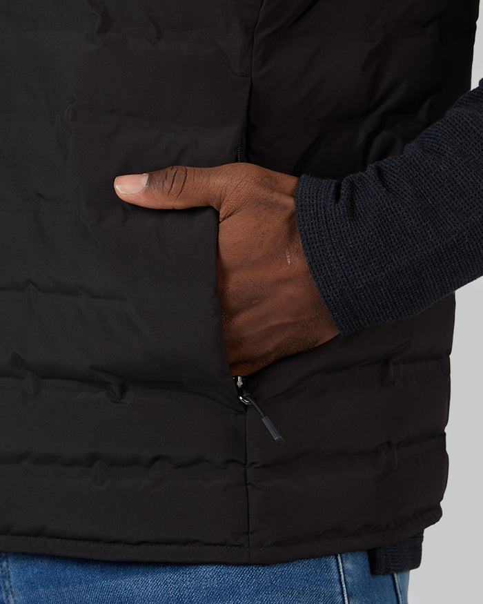 32 Degrees Black _ Men's Lightweight Packable Vest {model: Tradell is 6'1", wearing size M}{bottom}{right} {bottom}{right}
