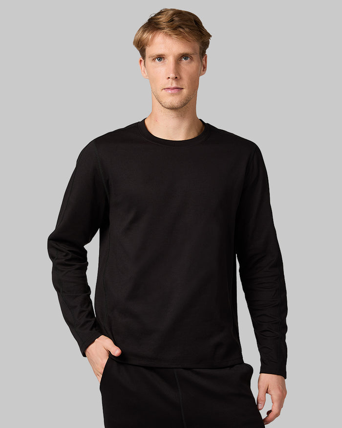 32 Degrees Black _ Men's Luxe Flex Long Sleeve Crew Top {model: David is 6'2", wearing size M}{bottom}{right} {bottom}{right}