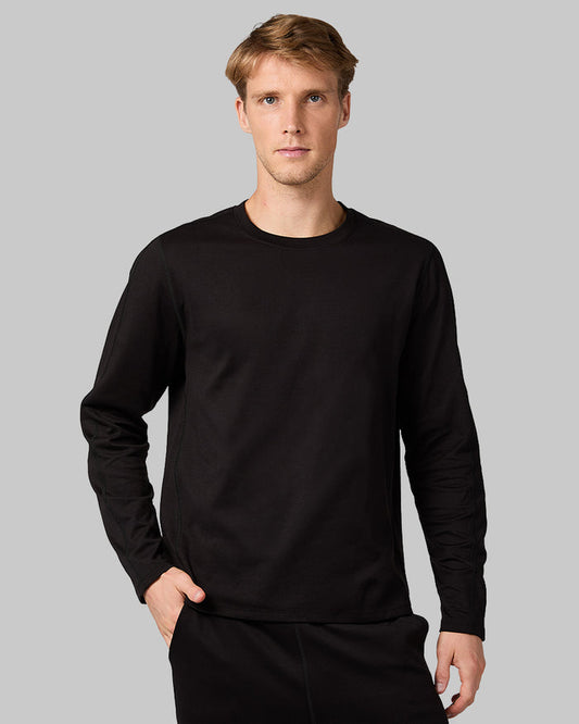 32 Degrees Black _ Men's Luxe Flex Long Sleeve Crew Top {model: David is 6'2", wearing size M}{bottom}{right} {bottom}{right}