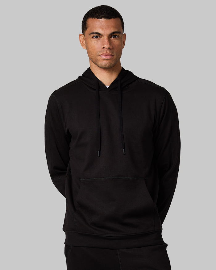 32 Degrees Black_ Men's Luxe Flex Pullover Hoodie {model: Quinten is 6'1", wearing size M}{bottom}{right} {bottom}{right}