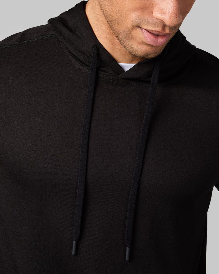32 Degrees Black_ Men's Luxe Flex Pullover Hoodie {model: Quinten is 6'1", wearing size M}{bottom}{right} {bottom}{right}
