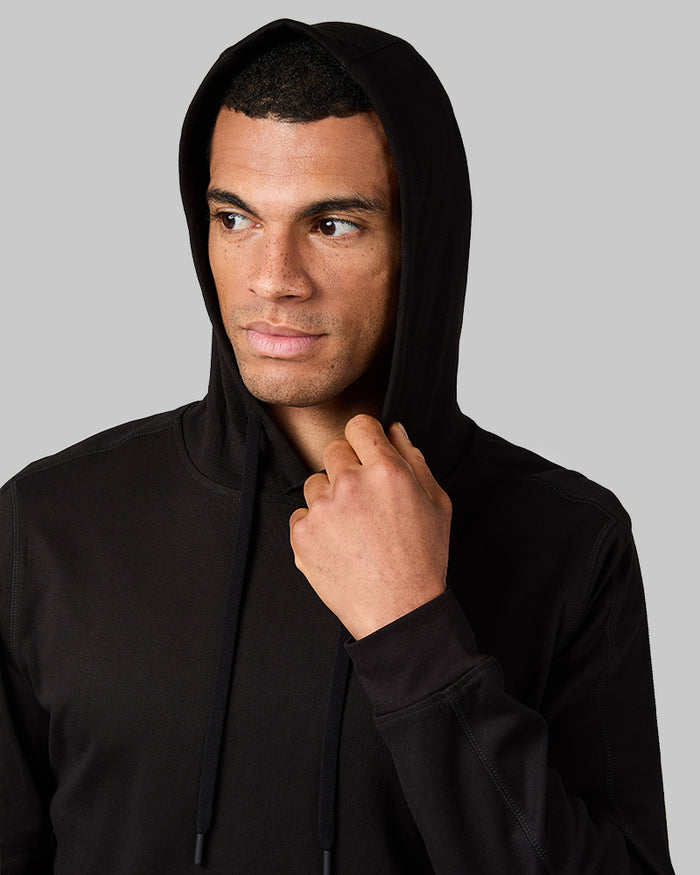 32 Degrees Black_ Men's Luxe Flex Pullover Hoodie {model: Quinten is 6'1", wearing size M}{bottom}{right} {bottom}{right}