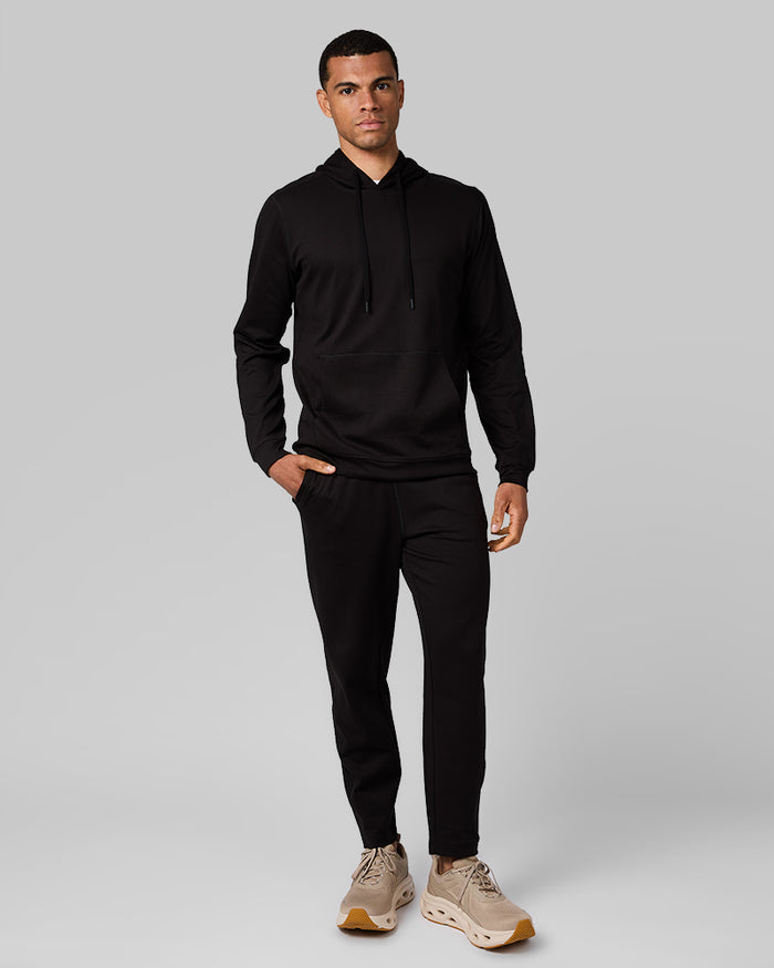 32 Degrees Black_ Men's Luxe Flex Pullover Hoodie {model: Quinten is 6'1", wearing size M}{bottom}{right} {bottom}{right}