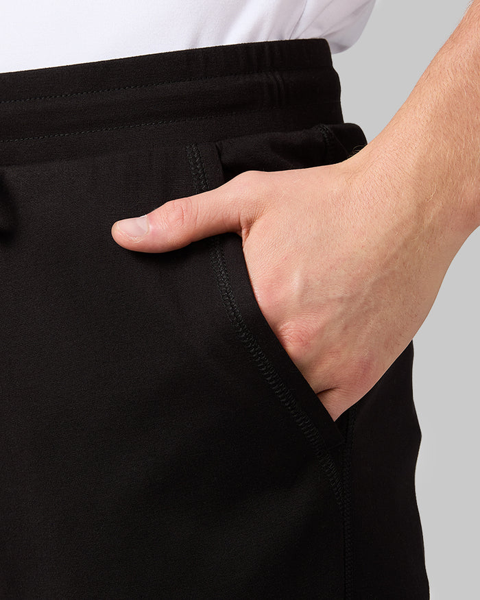 32 Degrees Black _ Men's Luxe Flex Short {model: David is 6'2", wearing size M}{bottom}{right} {bottom}{right}