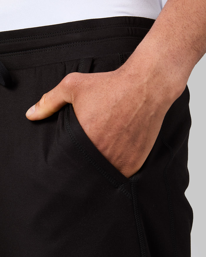 32 Degrees Black_ Men's Luxe Flex Pant {model: Quinten is 6'1", wearing size M}{bottom}{right} {bottom}{right}