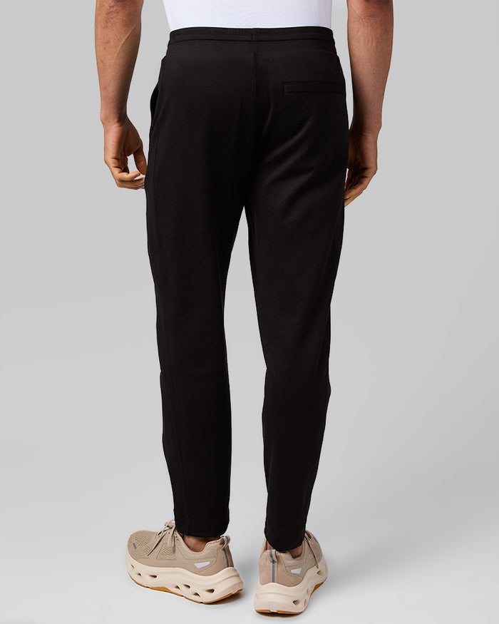 32 Degrees Black_ Men's Luxe Flex Pant {model: Quinten is 6'1", wearing size M}{bottom}{right} {bottom}{right}