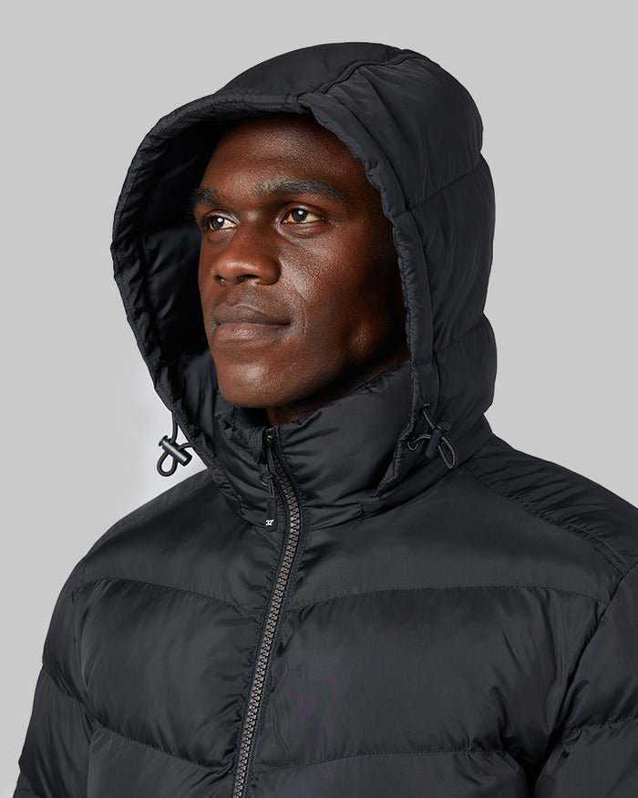 32 Degrees Black _ Men's Microlux Heavy Poly-Fill Puffer Jacket {model: Darius is 6'1", wearing size M]{bottom}{right} {bottom}{right}