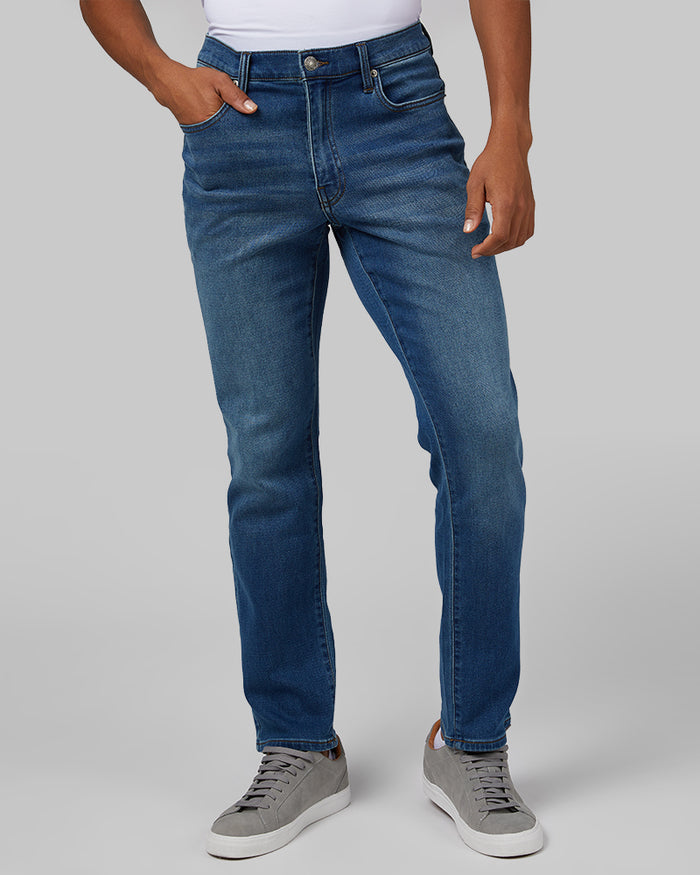 32 Degrees Medium Wash _ Men's Stretch Comfort "Sweatpant" Jean {model: Anthony is 6'0", wearing size M}{bottom}{right} {bottom}{right}