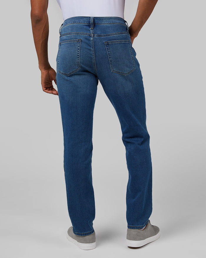 32 Degrees Medium Wash _ Men's Stretch Comfort "Sweatpant" Jean {model: Anthony is 6'0", wearing size M}{bottom}{right} {bottom}{right}