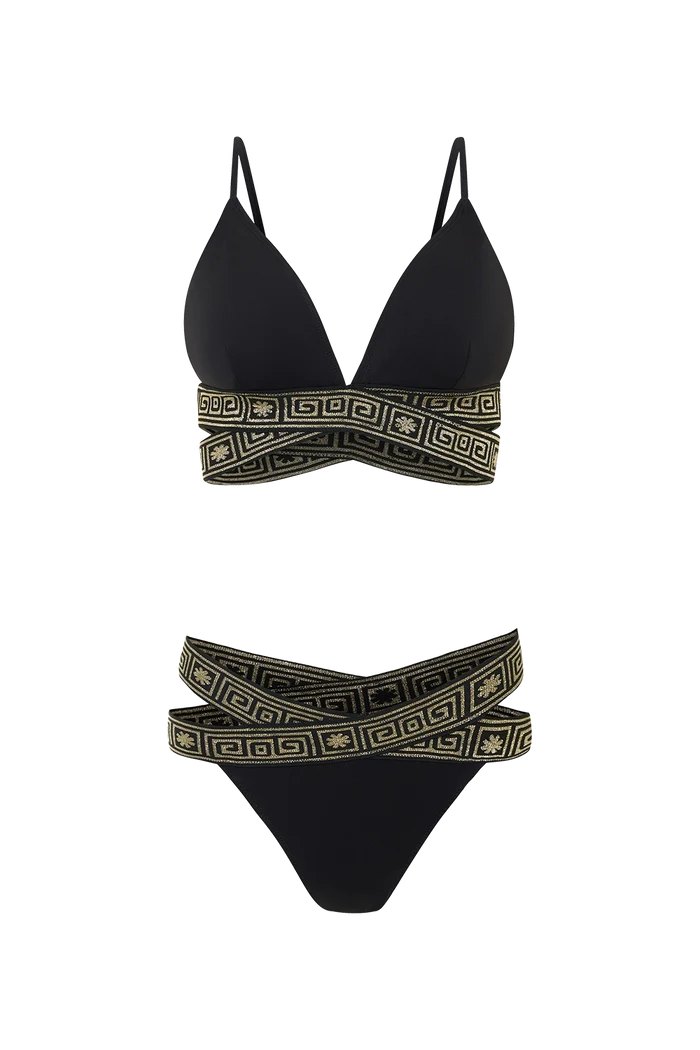 Black bikini set with geometric patterned straps on a white background