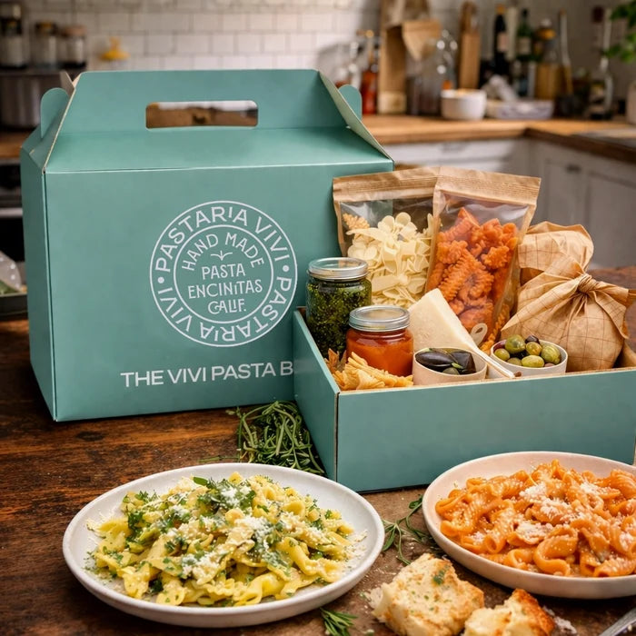 Pastaria Vivi Pasta subscription box with pasta dishes and ingredients on a wooden table