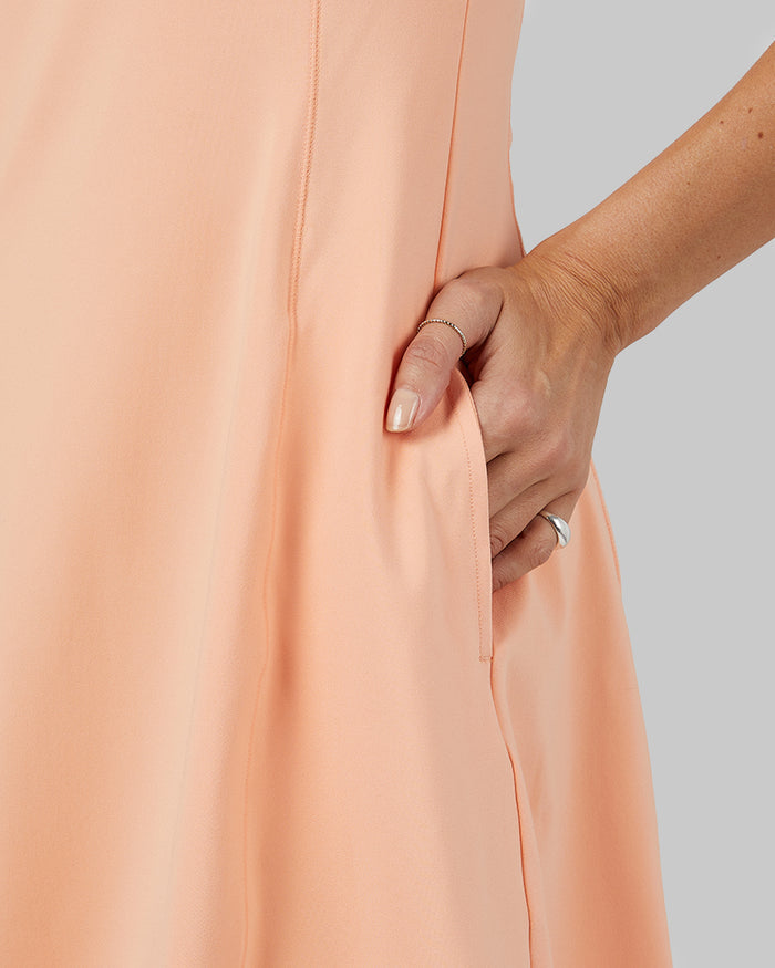 32 Degrees Peach Nectar _ Women's 1/4 Zip Active Bra Dress {model: Scarlett is 5'10"and size 4 wearing size S}{bottom}{right} {bottom}{right}