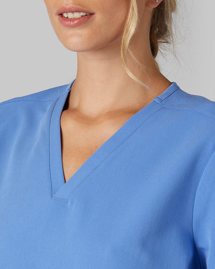 32 Degrees Blue Sky _ Women's 2-Pocket V-Neck scrub Top {model: Colby is 5'9"and size 4 wearing size S}{bottom}{right} {bottom}{right}