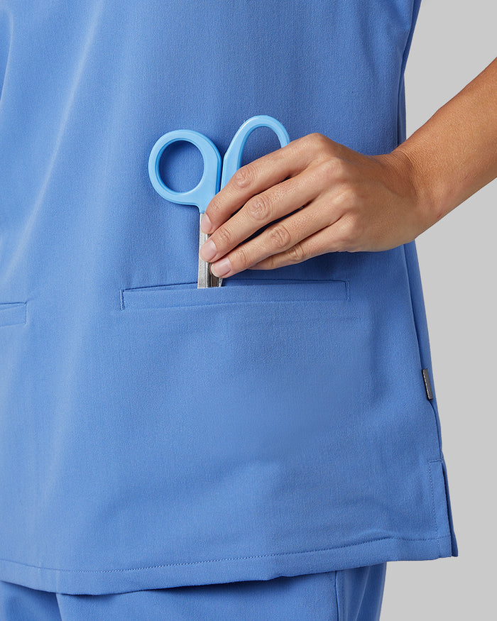 32 Degrees Blue Sky _ Women's 2-Pocket V-Neck scrub Top {model: Colby is 5'9"and size 4 wearing size S}{bottom}{right} {bottom}{right}