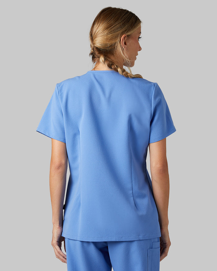 32 Degrees Blue Sky _ Women's 2-Pocket V-Neck scrub Top {model: Colby is 5'9"and size 4 wearing size S}{bottom}{right} {bottom}{right}