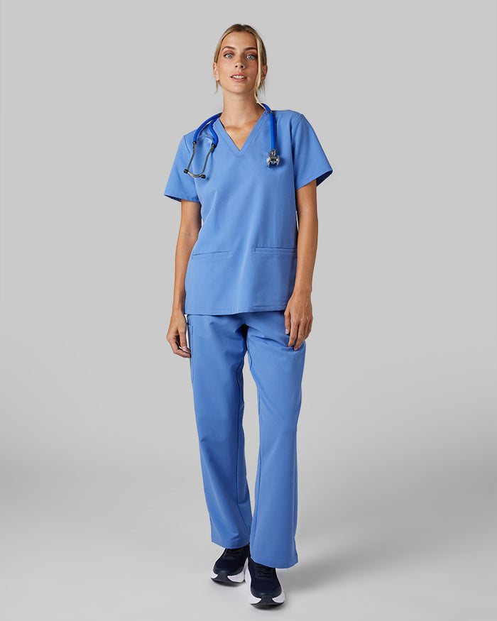 32 Degrees Blue Sky _ Women's 2-Pocket V-Neck scrub Top {model: Colby is 5'9"and size 4 wearing size S}{bottom}{right} {bottom}{right}
