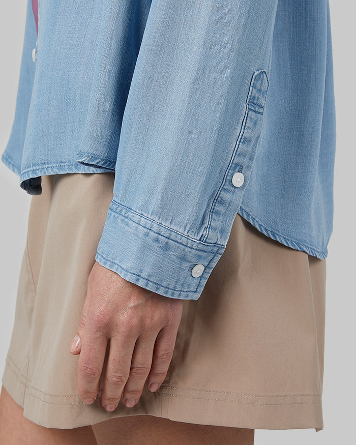 32 Degrees Light Blue _ Women's Chambray Long sleeve Button-Up {model: Shaina is 5'10"and size 4, wearing size S}{bottom}{right} {bottom}{right}