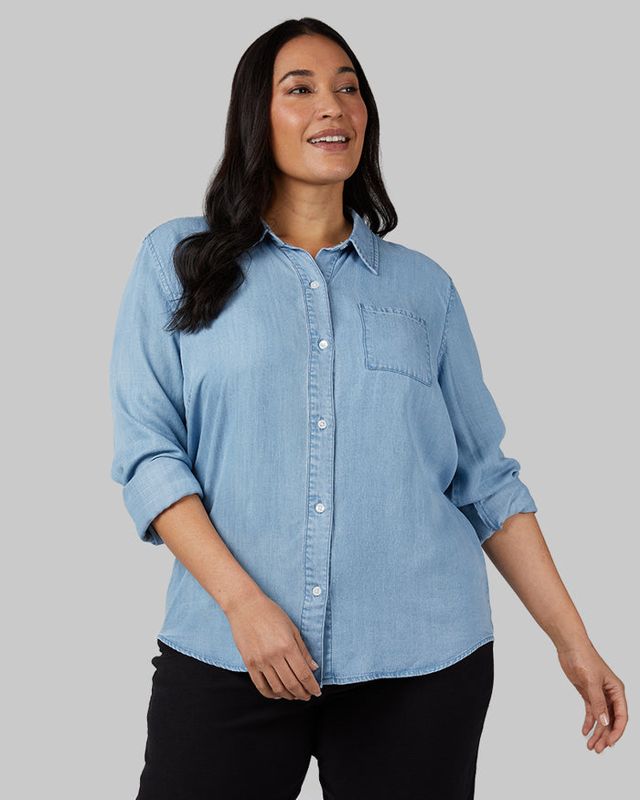 32 Degrees Light Blue _ Women's Chambray Long sleeve Button-Up {model: Amanda is 5'8"and size 14, wearing size L}{bottom}{right} {bottom}{right}