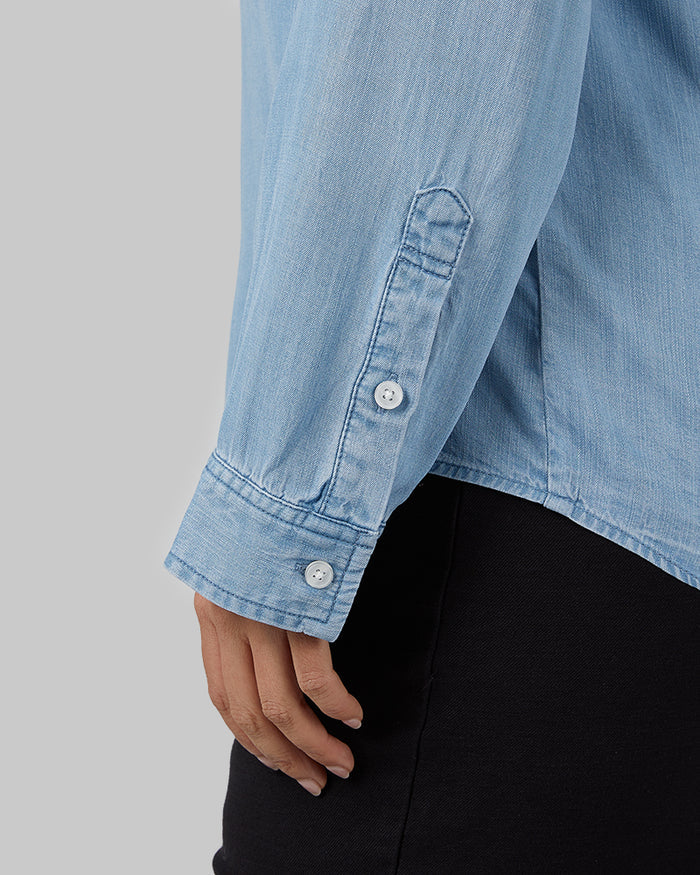 32 Degrees Light Blue _ Women's Chambray Long sleeve Button-Up {model: Amanda is 5'8"and size 14, wearing size L}{bottom}{right} {bottom}{right}