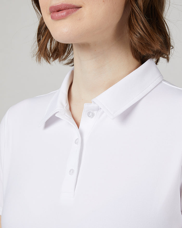 32 Degrees White _ Womens Cool Fitted Polo {model: Julie is 5'9" and size 6-8, wearing size S}{bottom}{right} {bottom}{right}
