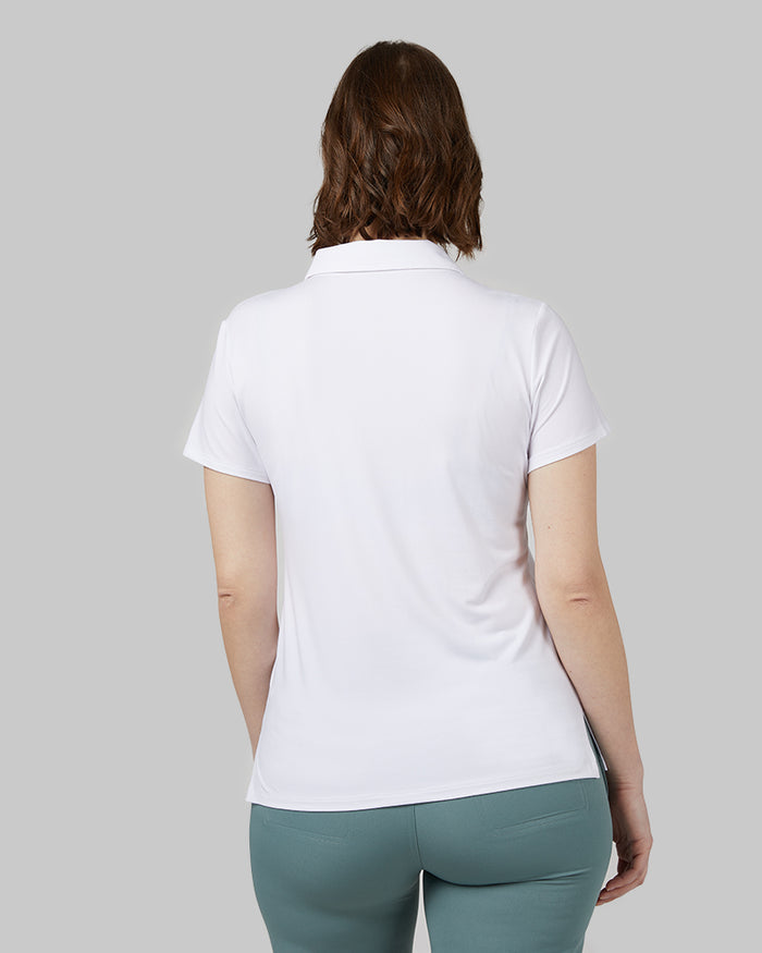 32 Degrees White _ Womens Cool Fitted Polo {model: Julie is 5'9" and size 6-8, wearing size S}{bottom}{right} {bottom}{right}