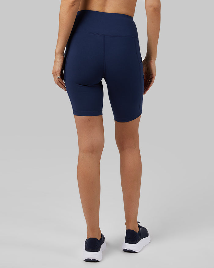 32 Degrees Inky Indigo _ Women's High-Waist Active 7-Inch short {model: Scarlett is 5'10"and size 4 wearing size S}{bottom}{right} {bottom}{right}