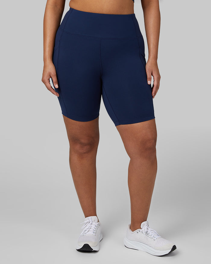 32 Degrees Inky Indigo _ Women's High-Waist Active 7-Inch short {model: Aimee is 5'9"and size 12 wearing size L}{bottom}{right} {bottom}{right}