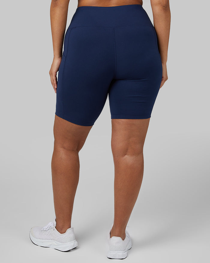 32 Degrees Inky Indigo _ Women's High-Waist Active 7-Inch short {model: Aimee is 5'9"and size 12 wearing size L}{bottom}{right} {bottom}{right}