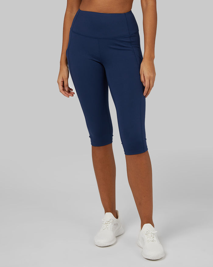 32 Degrees Inky Indigo _ Women's High-Waist Active Crop Legging {model: Victoria is 5'10"and size 4-6 wearing size S}{bottom}{right} {bottom}{right}