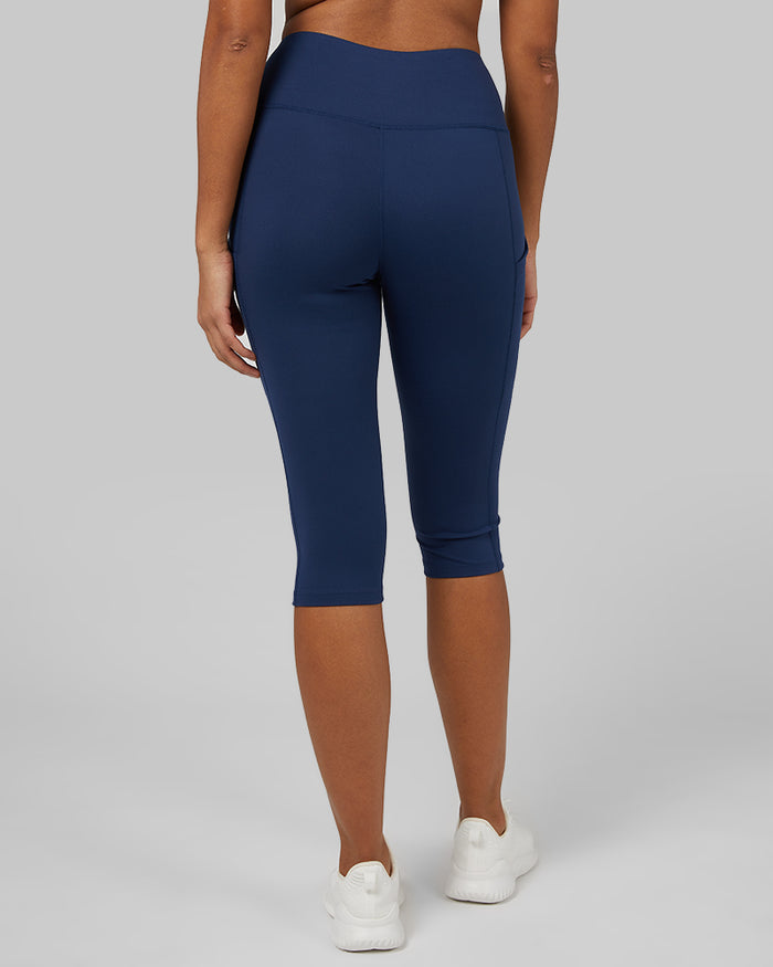 32 Degrees Inky Indigo _ Women's High-Waist Active Crop Legging {model: Victoria is 5'10"and size 4-6 wearing size S}{bottom}{right} {bottom}{right}