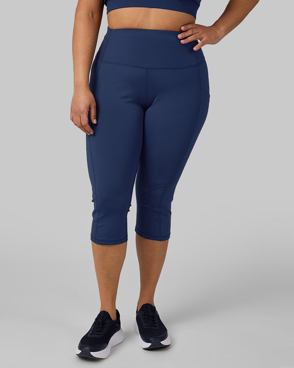 32 Degrees Inky Indigo _ Women's High-Waist Active Crop Legging {model: Maria is 5'9"and size 14 wearing size L}{bottom}{right} {bottom}{right}