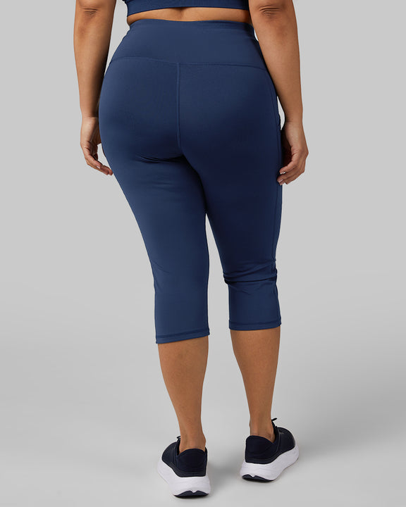 32 Degrees Inky Indigo _ Women's High-Waist Active Crop Legging {model: Maria is 5'9"and size 14 wearing size L}{bottom}{right} {bottom}{right}