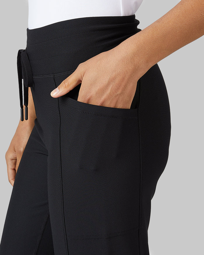 32 Degrees Black _ Women's High-Waist Active Rib Flare Pant {model: Lisa-Marie is 5'9"and size 2-4 wearing size S}{bottom}{right} {bottom}{right}