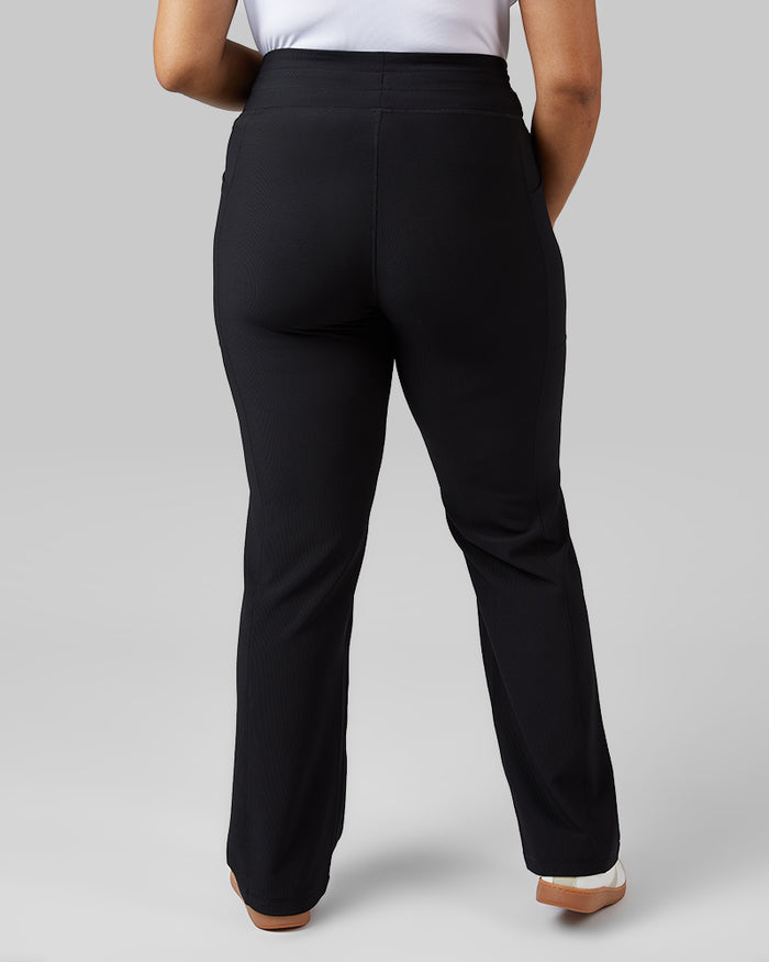 32 Degrees Black _ Women's High-Waist Active Rib Flare Pant {model: Jeharna is 5'9and size 14 wearing size L}{bottom}{right} {bottom}{right}