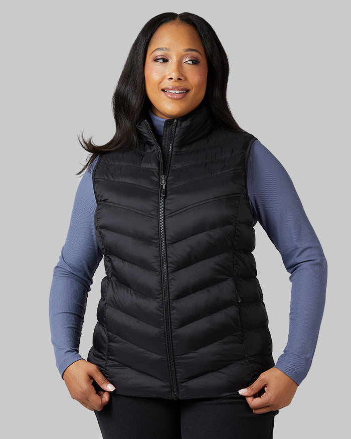32 Degrees Black _ Women's Lightweight Packable Vest {model: Jeharna is 5'9" and size 14 wearing size L}{bottom}{right} {bottom}{right}