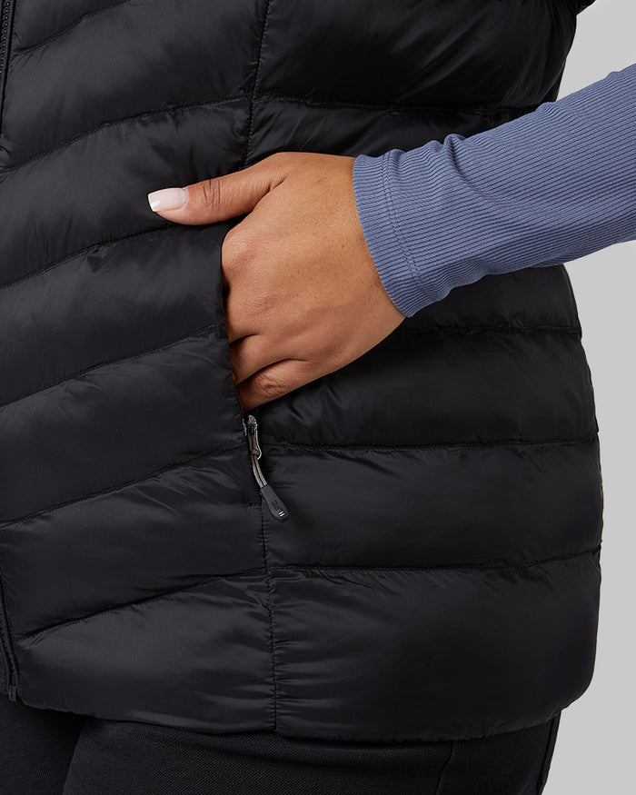 32 Degrees Black _ Women's Lightweight Packable Vest {model: Jeharna is 5'9" and size 14 wearing size L}{bottom}{right} {bottom}{right}